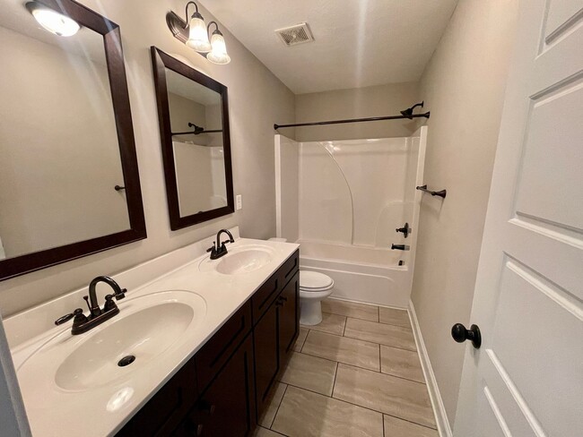 Building Photo - Whispering Pines 4 Bedroom 3.5 Bathroom Re...