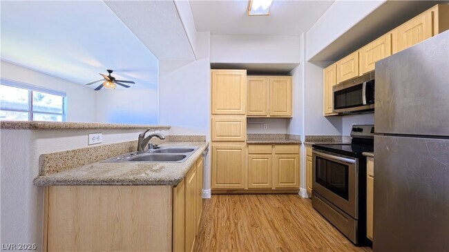 Building Photo - 8000 W Badura Ave