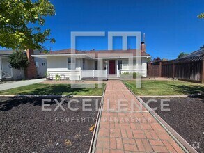 Building Photo - 4/2 House With Yard, Hardwood Floors, Pets...