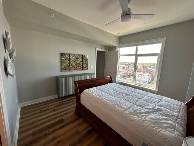 Building Photo - Two bedroom end unit condo with stunning d...