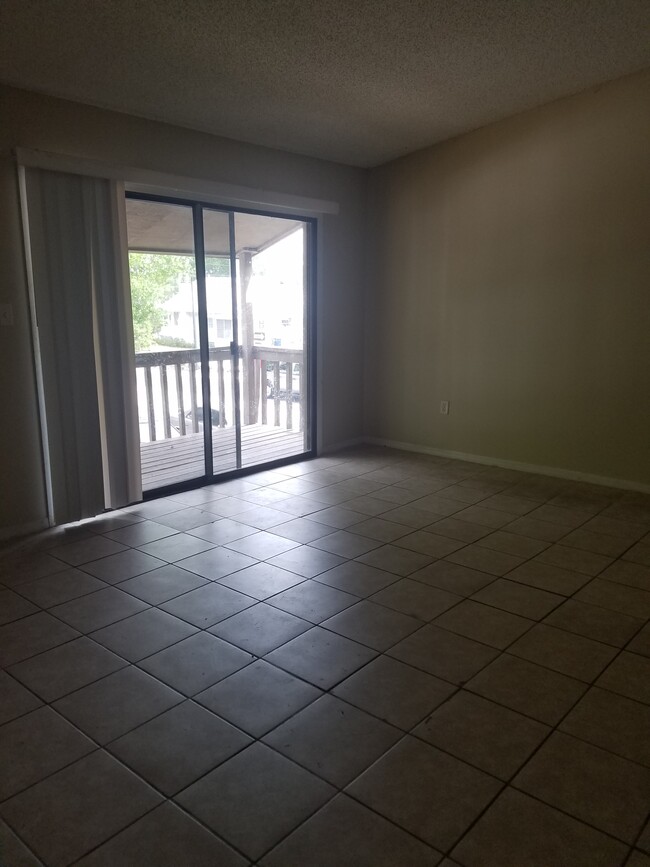 Second floor living room by fireplace - 408 N St Clair Abrams Ave