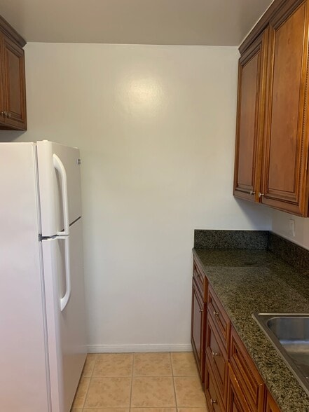 Full Size Refrigerator with overhead Storage - 4302 Elm Ave