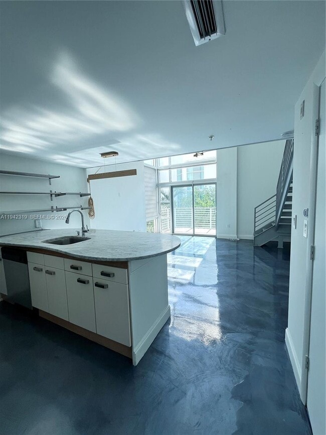 Building Photo - 7744 Collins Ave