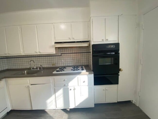 Building Photo - A spacious two bedroom, one and one half bath condo townhouse located in the northern section of ...