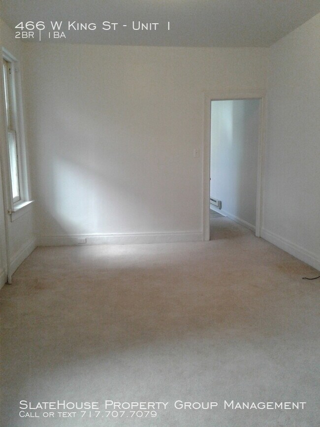 Building Photo - First floor two bedroom with yard!