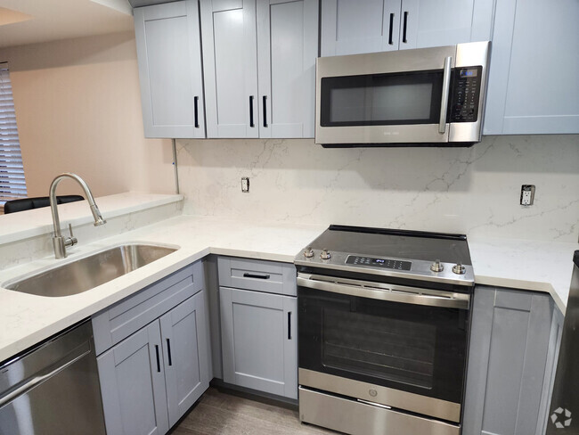 Recently remodeled kitchen/appliance/countertop - 2040 Main St