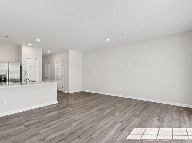 Building Photo - Free Application Fee — Refunded Upon Approval Through August 31! Modern 3BR/3BA Townhome with Gar...