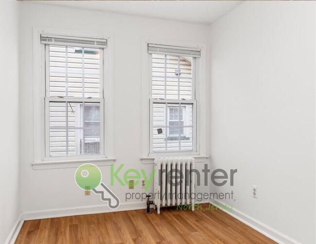 Building Photo - Spacious 3-Bed, 2-Bath Nutley Home with Bonus Office, Multi-Level Deck & Quiet Location