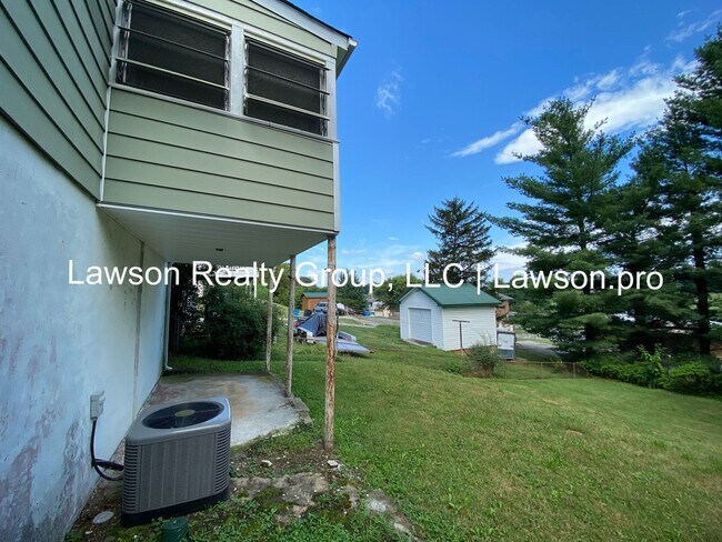 Building Photo - Updated Four Bedroom Home with a Full Walkout Basement