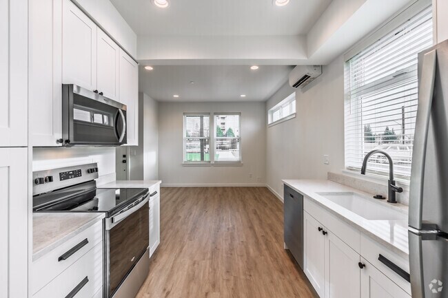 3BR, 2.5BA - 1,553SF - Kitchen - City Apartments