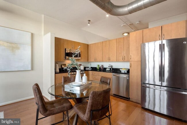 Building Photo - Incredible 11th Floor 2BR/2BA Condo (including reserved garage parking) in Vibrant Mount Vernon T...