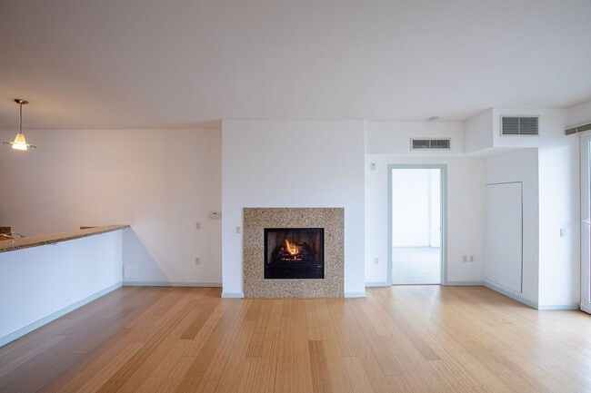 Building Photo - Sweet + secure 1/1 condo with parking, extra storage room + AC available now!