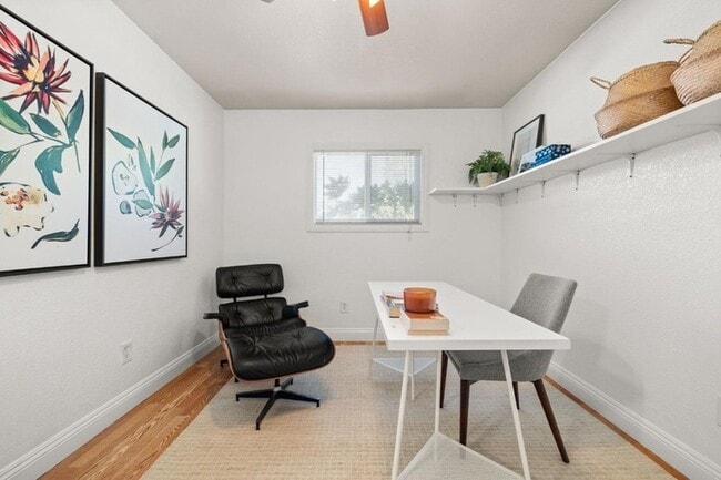 Building Photo - Welcome to this stunning 4-bedroom, 2-bath...