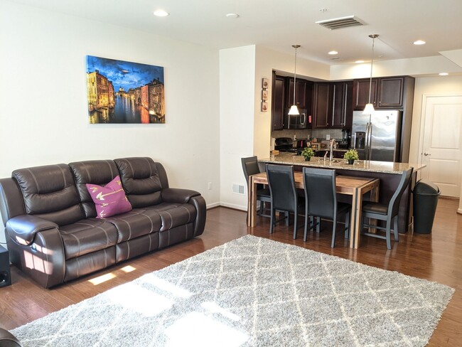 Building Photo - Bottom level (two story) *END UNIT* condo ...