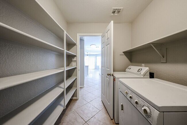 Building Photo - Introducing a stunning 4-bedroom, 2.5-bath...