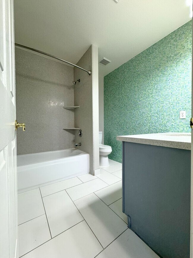 Building Photo - Fully renovated with a contemporary flair ...