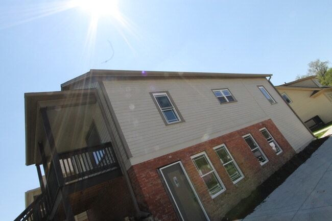 Building Photo - Modern One Bedroom Duplex at the Cottages -- A must-see!.