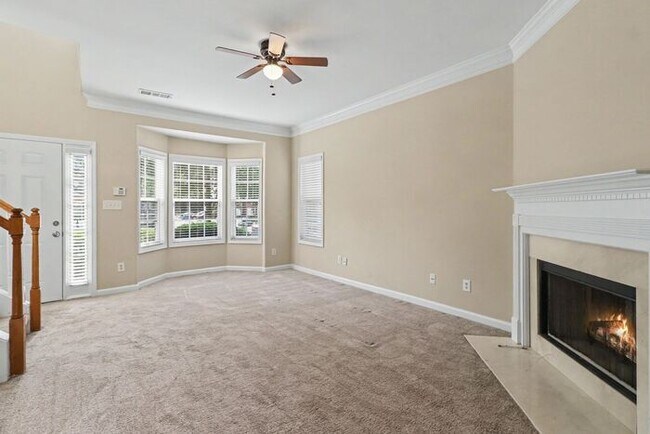 Building Photo - Exceptional 2BR/2.5BA End Unit Townhome in College Park!