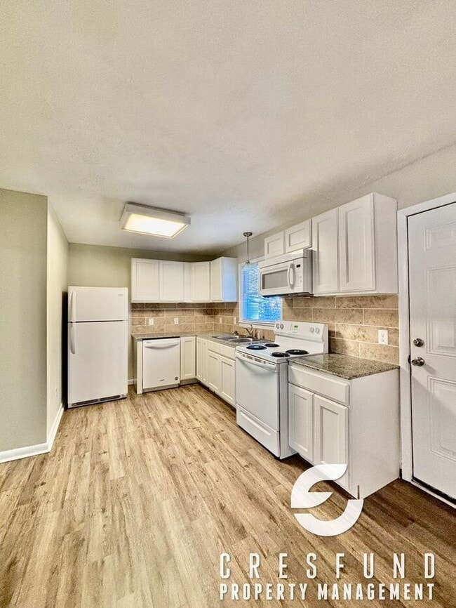 Building Photo - Commuter’s Dream! Gorgeous 3BR/2BA Home by...