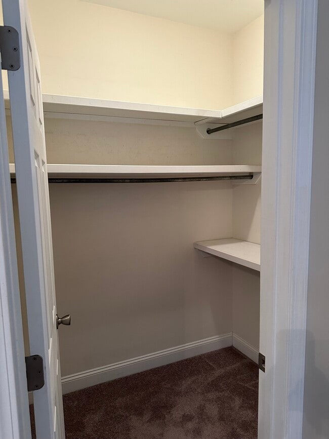 Walk in closet primary bedroom - 3406 Margrave Rd