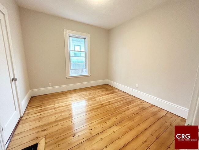 Building Photo - 11-13 Buttonwood St. Unit 1A
