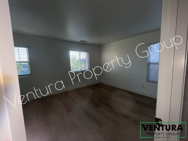 Building Photo - Spacious 4-Bed, 3-Bath Townhouse Retreat at The Gated Community at the Cottages