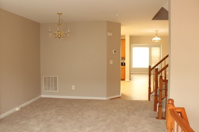 Building Photo - Beautiful 3-Level Townhouse with Finished Basement & Garage