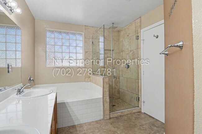 Building Photo - NW!! 4 bedrooms!! Bed & Bath DownStairs!!! RV Parking!!! Synthetic Grass Front yard!! Real Grass ...