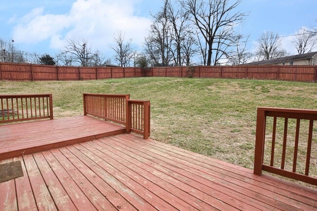 Building Photo - Pet Friendly Three Bedroom with Bonus!
