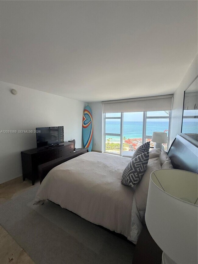 Building Photo - 10275 Collins Ave