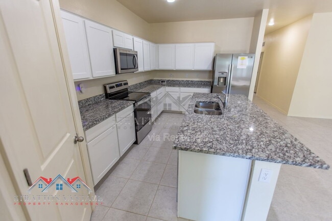 Building Photo - 5771 E Thetis Dr