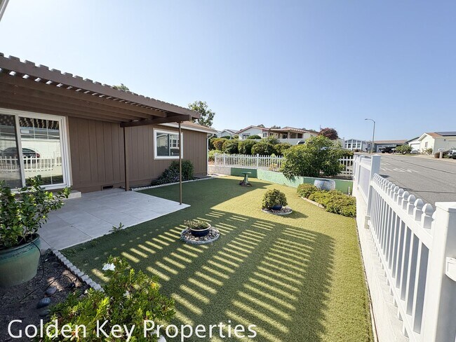 Building Photo - Welcome to the spacious single-level manuf...