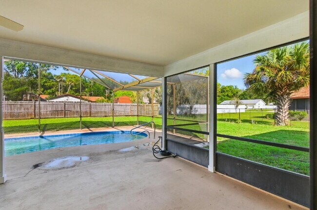 Building Photo - "Charming 3-Bedroom Oasis with 2 Baths on ...