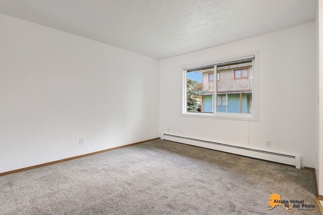 Building Photo - 1810 E 72nd Ave