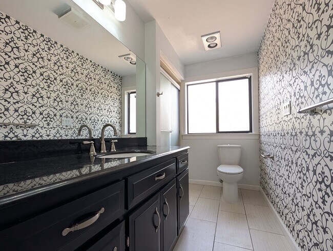 Building Photo - Updated 3-Bedroom, 2.5-Bath Home ~ Solid Surface Flooring and Spacious Kitchen!