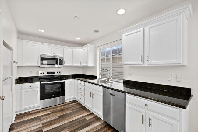 Building Photo - Cozy DuPont Home with Fenced Yard, 2-Car Garage & Minutes to JBLM!