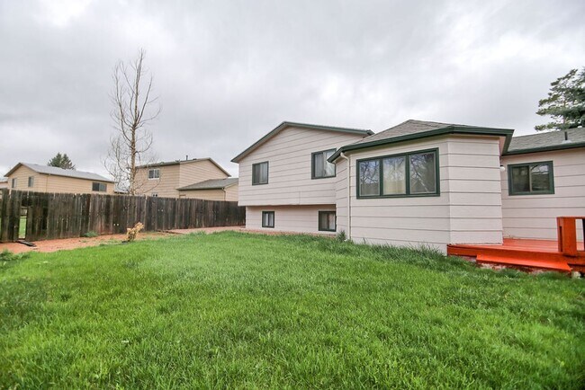 Building Photo - 4-Bedroom Home Near CSU | Fenced Yard & 2-Car Garage