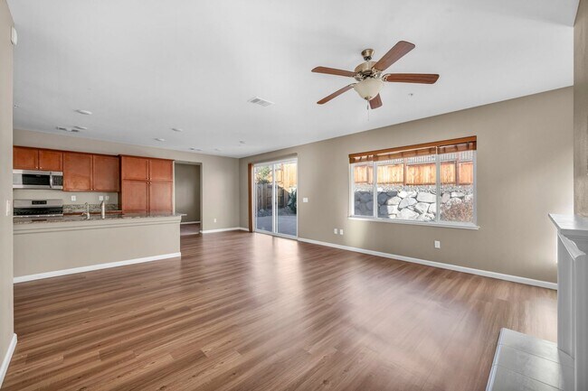 Building Photo - Sun-Filled, Spacious Living with a Three-Car Garage