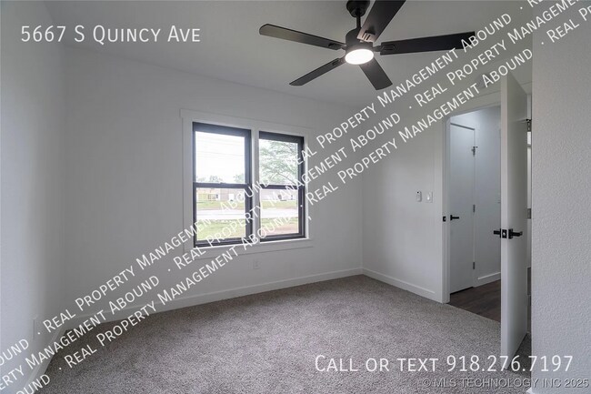 Building Photo - 5667 S Quincy Ave