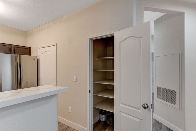 Building Photo - Upgraded First-Floor Condo in a Gated Summ...