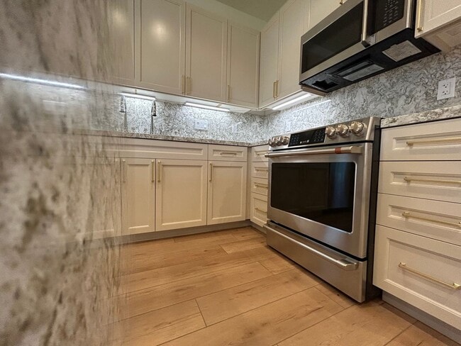 Building Photo - Lafayette Penthouse Living – Two Exquisite...