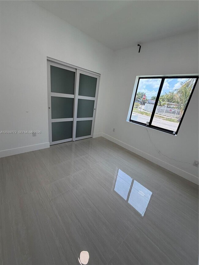 Building Photo - 9708 NW 26th Ave