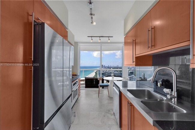 Building Photo - 6365 Collins Ave