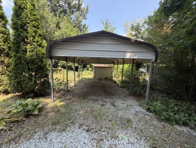 Building Photo - Three Levels of Living with 4 Bedrooms, 2 Full Bathrooms and Multiple Living Areas!