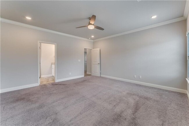 Building Photo - Minutes from I-49! 4BR/2.5BA Home