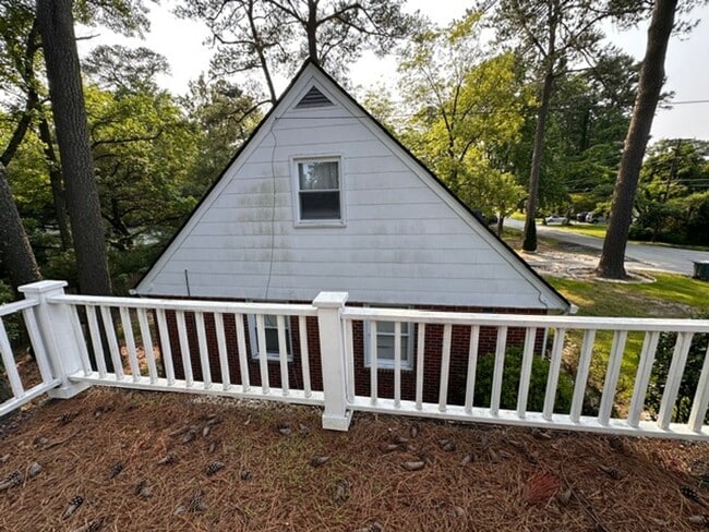 Building Photo - Charming Brick Cape Cope