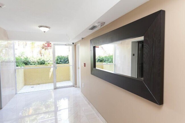 Building Photo - 5880 Collins Ave