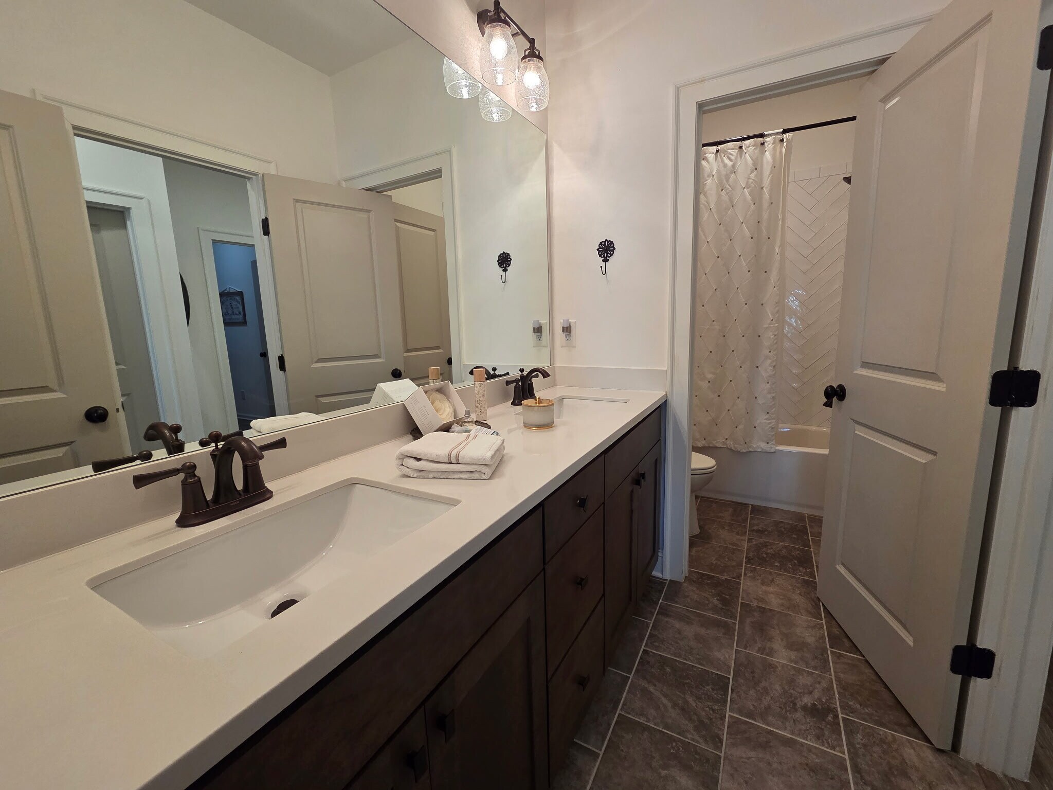 Guest bath with dual vanity and separate water closet and shower - 423 Johnson Ct