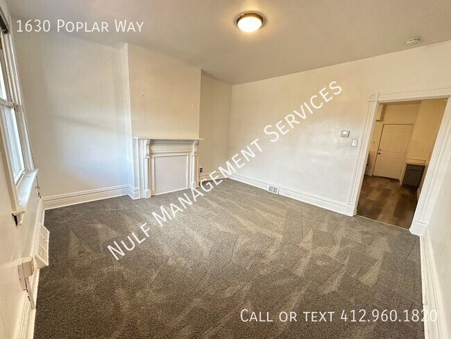 Building Photo - 1630 Poplar Ave