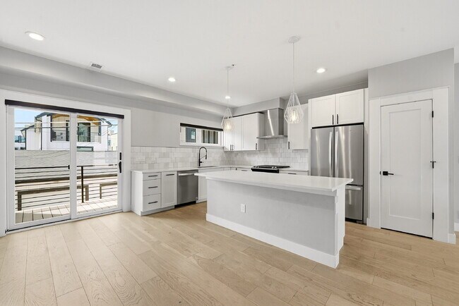 Building Photo - $3,565.95 with $300 off the first month's rent, 2 Beds - 3 Baths, Townhouse in Denver with Unmatc...
